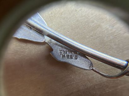 Huit petites cuillères souvenir en argent...