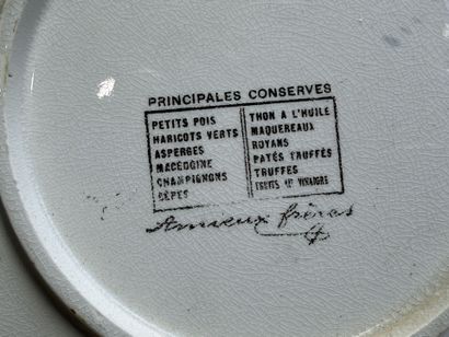 Assiette publicitaire en faïence pour les...