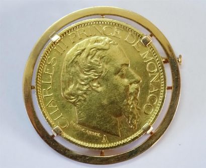Pièce 100 francs en or 1886, montée en broche...