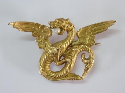 Broche ou pendentif en or à décor de dragon...