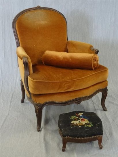 Bergère de style Louis XV en chêne mouluré...