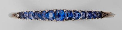 Bracelet rigide ouvrant en or jaune et or...