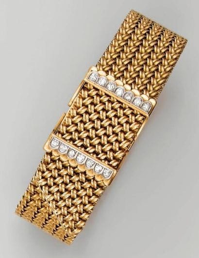 Bracelet en or jaune formé d'un ruban souple...