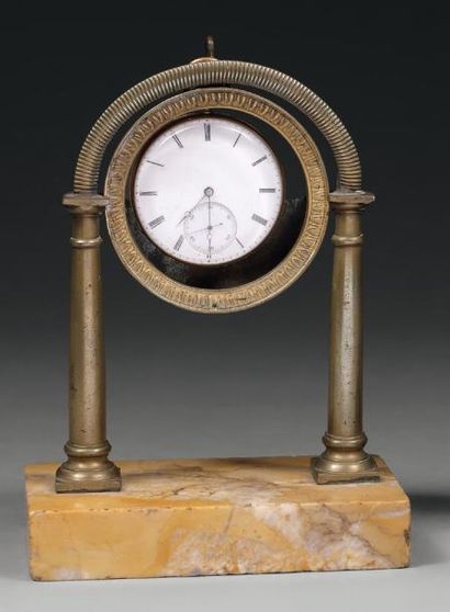Porte-montre portique en bronze doré et marbre...