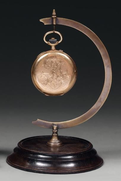 Montre savonnette en or chiffrée sur le couvercle,...