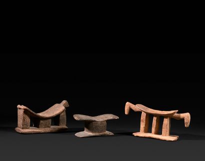 Lot of three funerary neck rests, one of...
