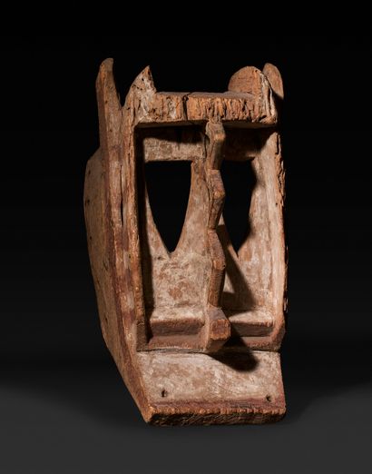 Mask with triangular eyes and detached zigzag...
