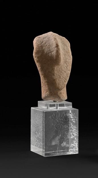 Anthropomorphic head from a stylized votive...