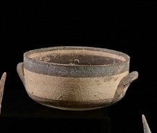 Deep bowl with two handles, decorated with...