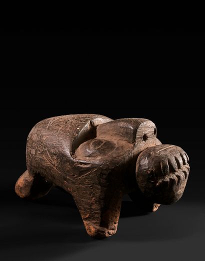 Surreal animal, the back showing a mask.

Mambila....