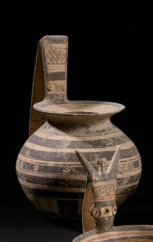 Jug with a globular body decorated with a...