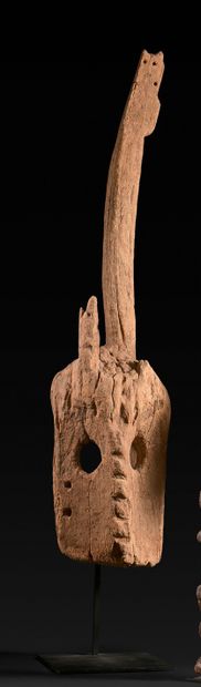 Large mask with long horn and round eyes...