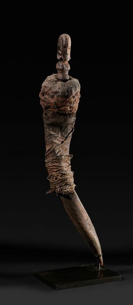 Twisted horn of fetish wrapped in a cloth....