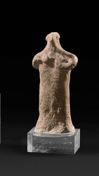 Stylized anthropomorphic votive statuette....