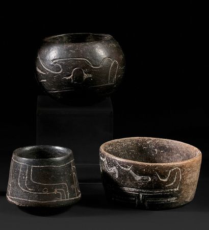 Three small terracotta vases, engraved for...