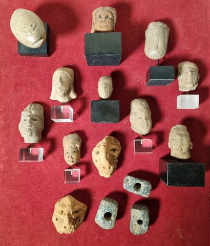 Lot of eight small heads and five pendants...