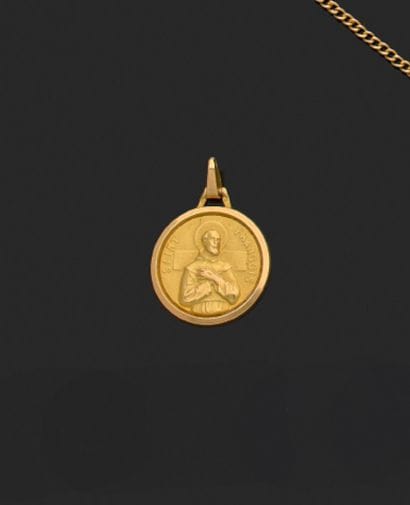 Médaille pendentif en or de Saint François.
Poids...