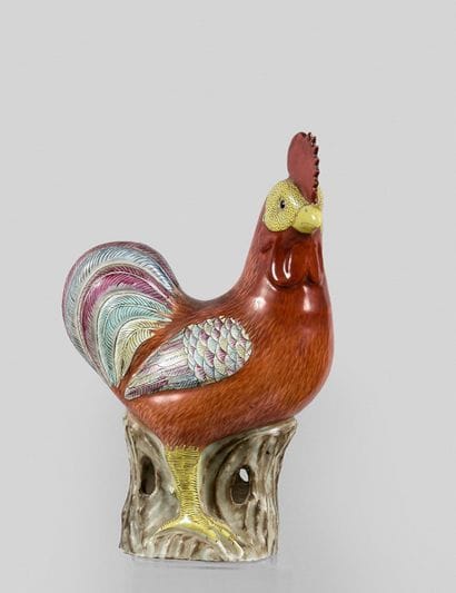A famille rose bisque and enamel statuette...