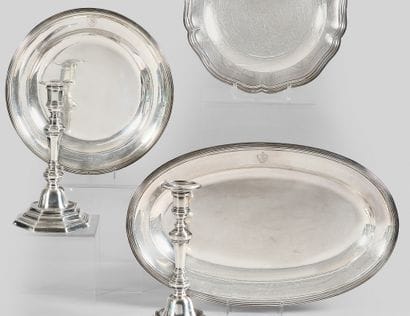 Plain silver oval dish and round dish with...