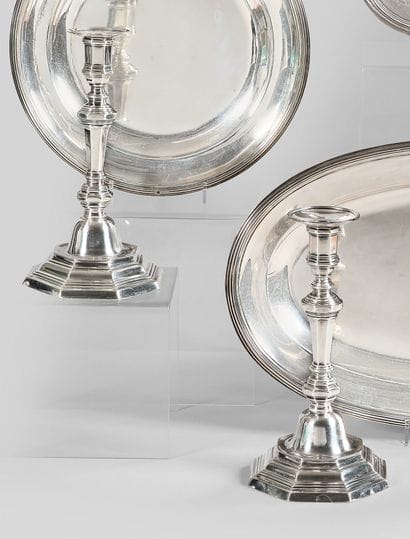 Pair of octagonal silver molded torches....