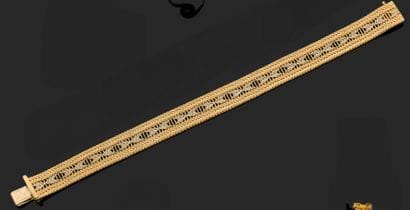 Bracelet ruban en or blanc et or jaune (750)...