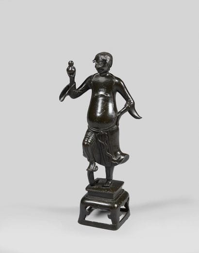Bronze statuette with brown patina, representing...