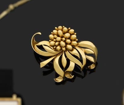 Chaumet Clip de revers en or jaune 750 millièmes...