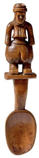 Cuillère pour homme en buis, au manche figurant...