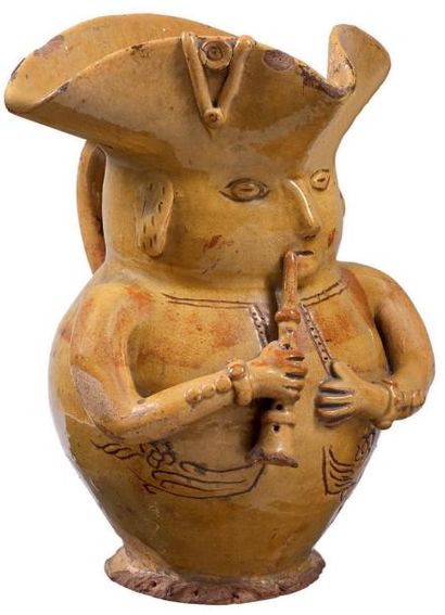 Rare pichet anthropomorphe en terre rouge...