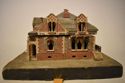 Maquette de maison aspect brique et toit...