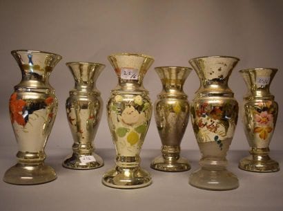 Six vases balustre en verre mercuré.