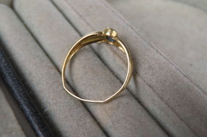 Bague en or jaune (750/1000e) ornée d'une...