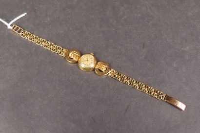Montre de dame, boîtier et bracelet en or...