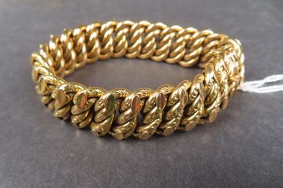 Bracelet en or jaune (750/1000e) à mailles...