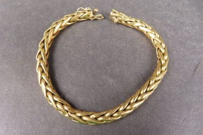 Bracelet à mailles entrelacées en or jaune...