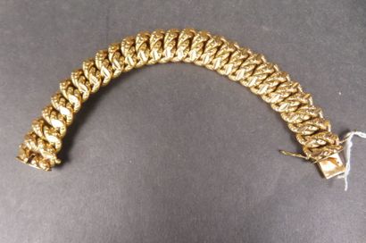 Bracelet en or jaune (750/1000e) à mailles...