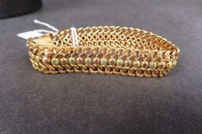Bracelet à mailles articulées en or jaune...