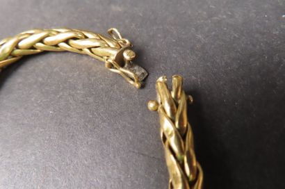 Bracelet à mailles entrelacées en or jaune...