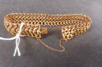 Bracelet à mailles articulées en or jaune...