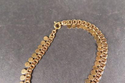 Collier en or jaune (750/1000e) à mailles...