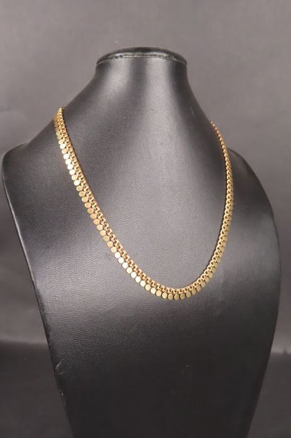 Collier en or jaune (750/1000e) à mailles...