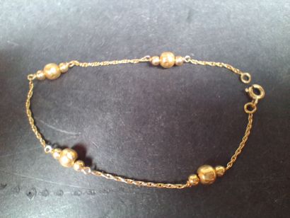 Bracelet en or jaune (750/1000e) à mailles...