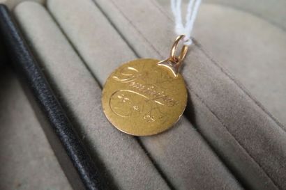 Médaille en or jaune (750/1000e) à profil...