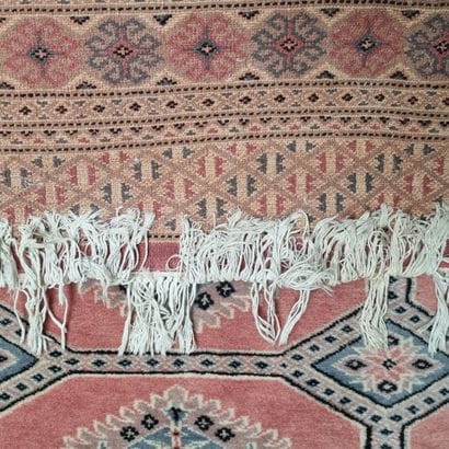 Tapis en laine à décor de motifs géométriques...