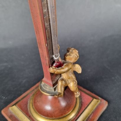 Thermomètre en bronze patiné rouge et doré,...