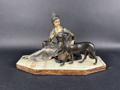Sujet Art Déco en régule patiné et onyx représentant...