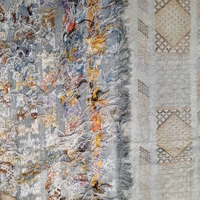 Tapis en laine à décor de motifs géométriques...