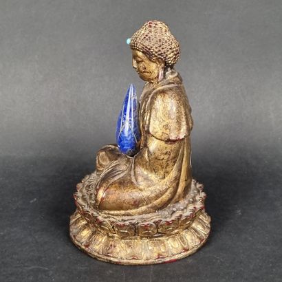 CHINE. Sujet en résine représentant un bouddha...