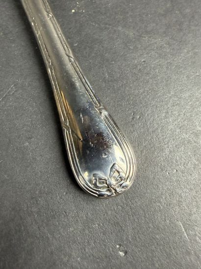 Partie de ménagère en inox modèle ruban comprenant...