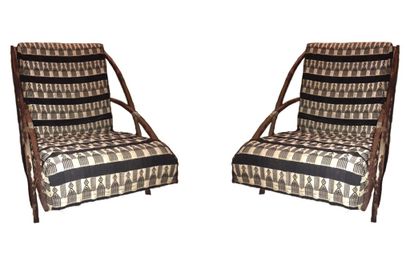 PAIR OF CHAIRS in rusted cast iron. Model...